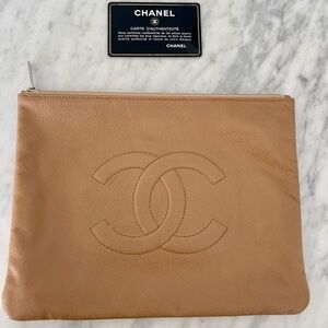 Beautiful pre-loved CHANEL medium O-case